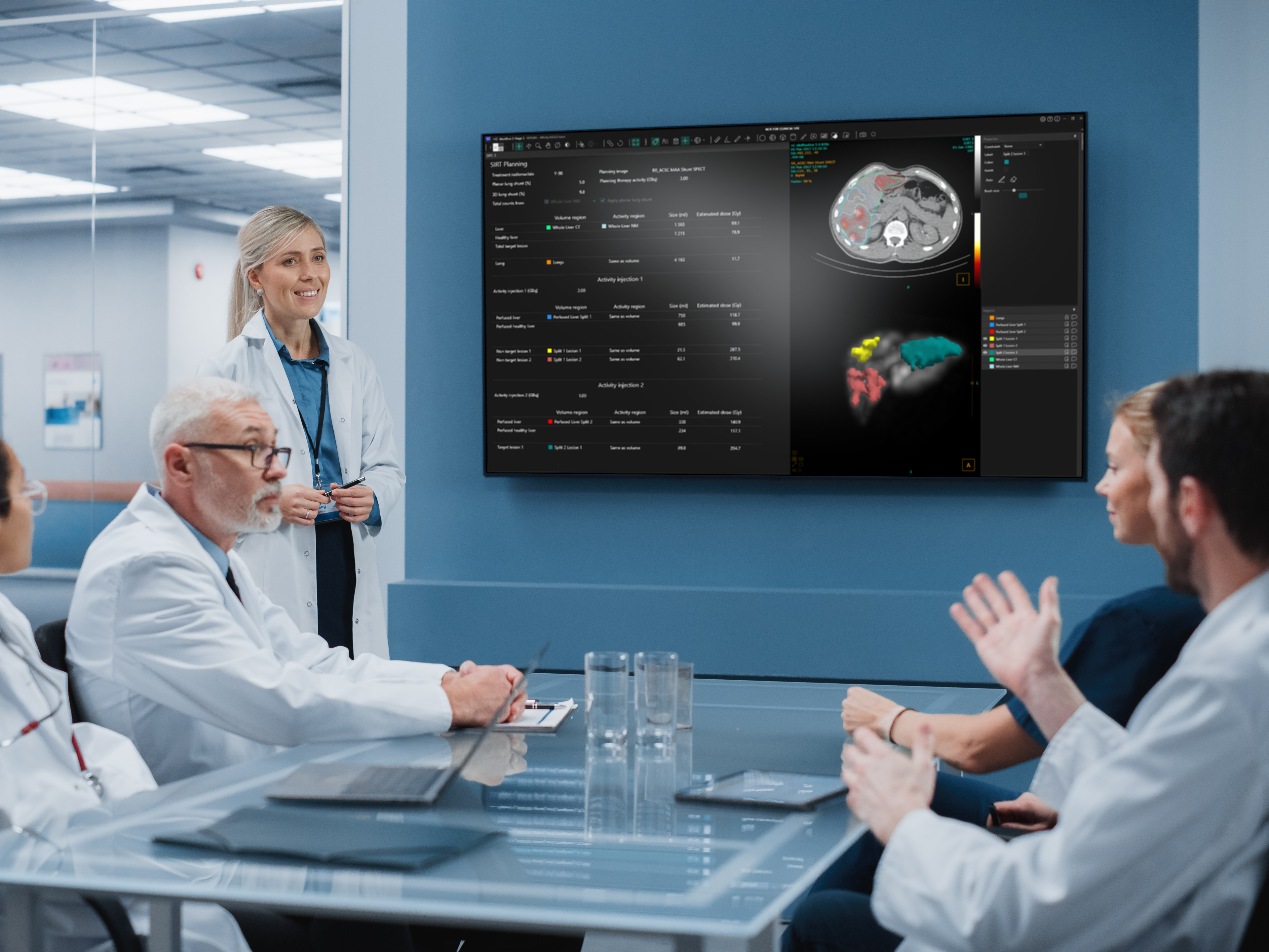 Doctors discussing Hermia SIRT tumorboard.