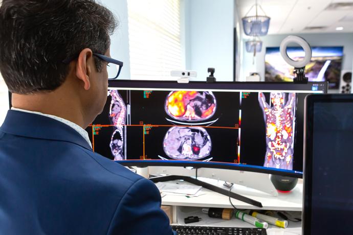 Dr. Ashok Muthukrishnan at Flordia Theranostics on Hermia workstation